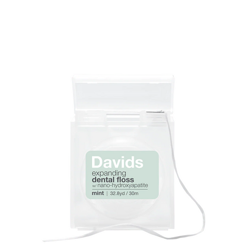 Expanding Dental Floss with Hydroxapatite