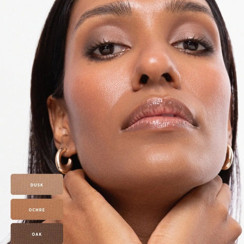 Model wearing Ere Perez Chamomile Eye Palette in Element Matte