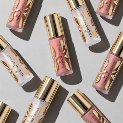 Fitglow Beauty Mini Lip Serums flat lay in gold-capped packaging