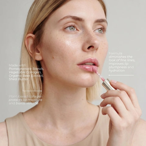 Model applying Fitglow Beauty Mini Lip Serum